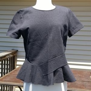 Peplum designer top
